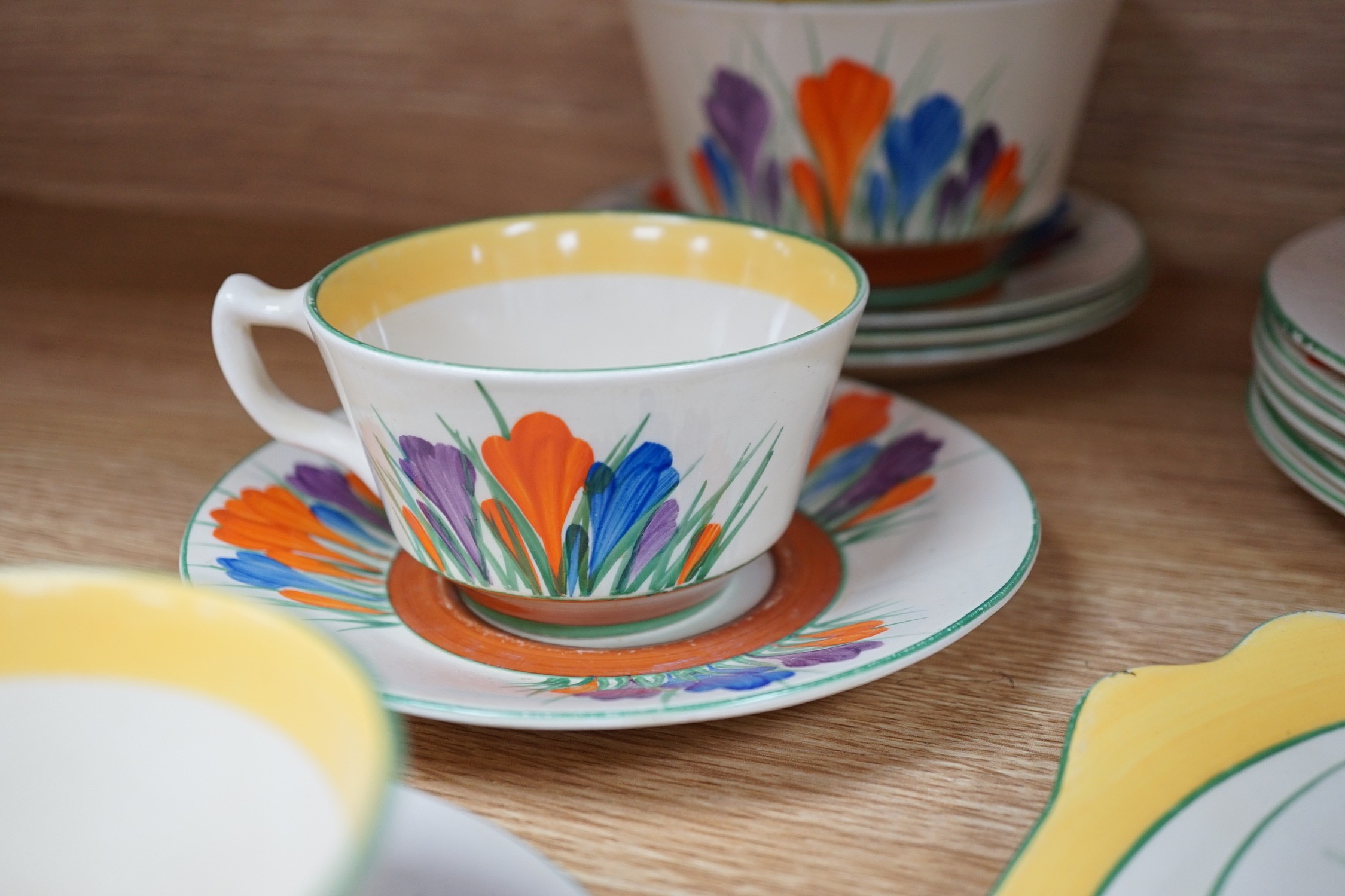 A Clarice Cliff seventeen piece Autumn Crocus part teaset, including a preserve jar and cover
